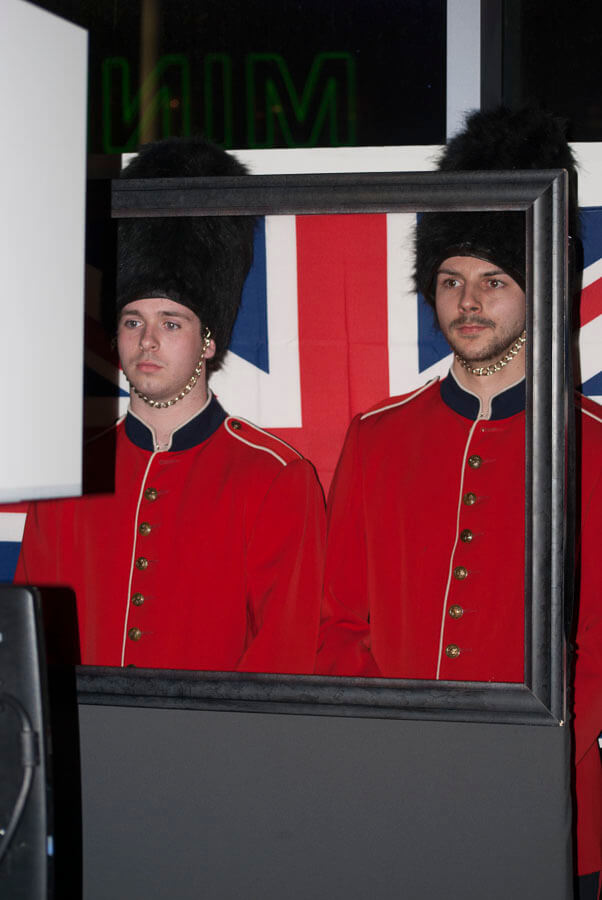iconic London guards posing in a photo booth