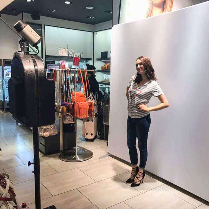 a woman posing in a retail store