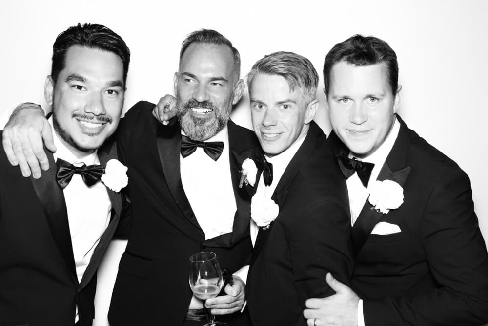 black-and-white-wedding-photo-booth-7 four men wearing tuxedos