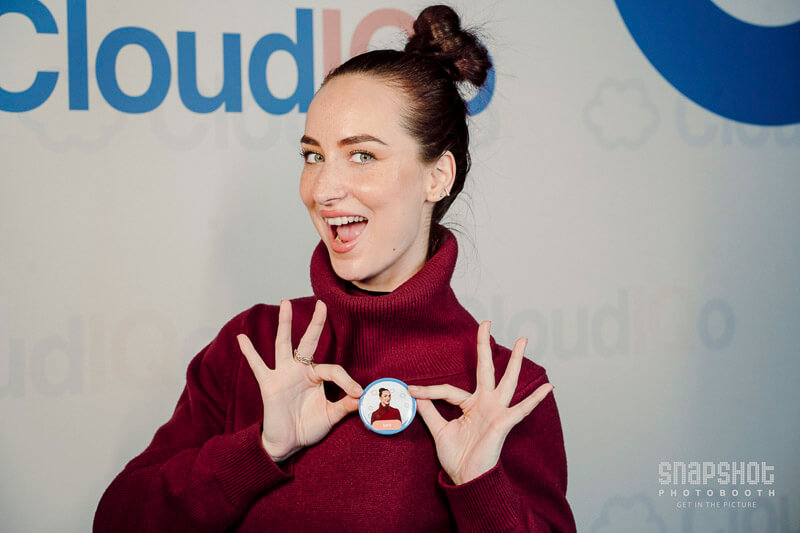 showing off her hand made button