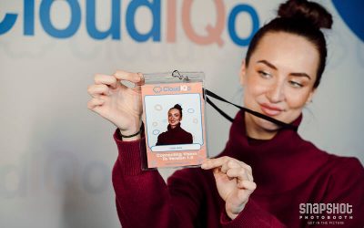 a person showing their photo booth lanyard